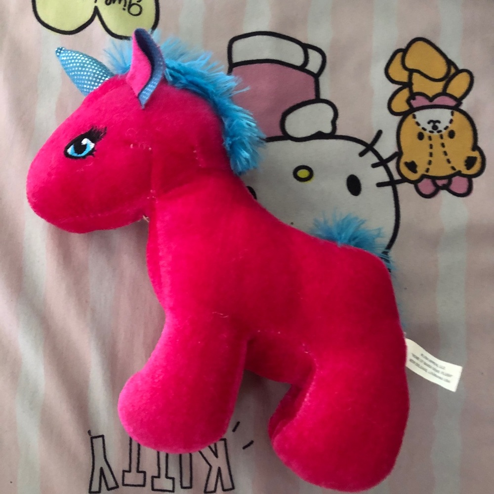 Red Unicorn With Blue hair
